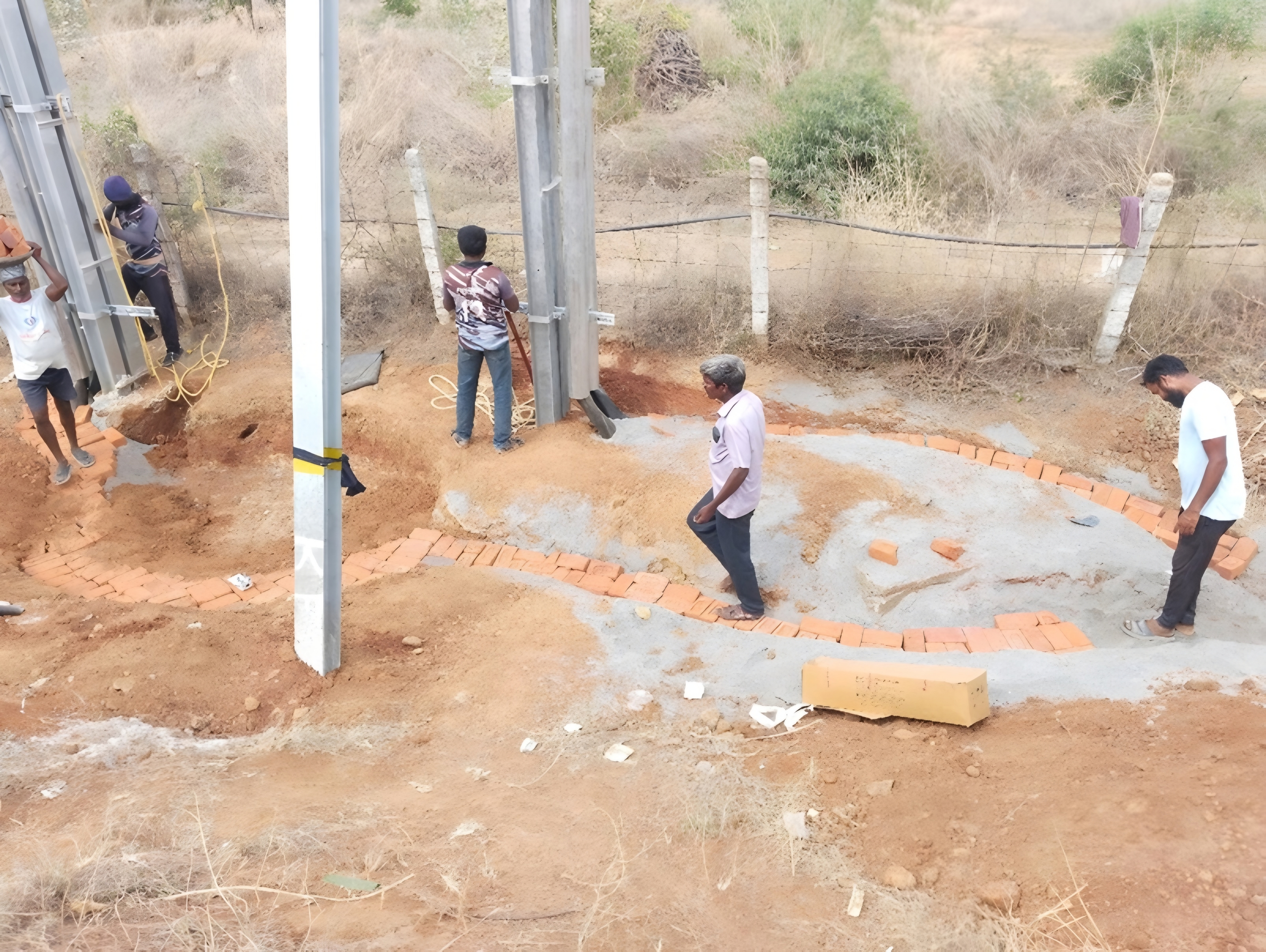 Workers building foundation